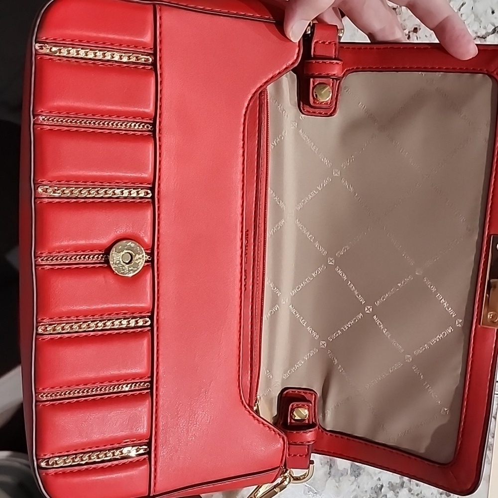 Gently used Michael Kors red leather crossbody bag. - Picture 11 of 12